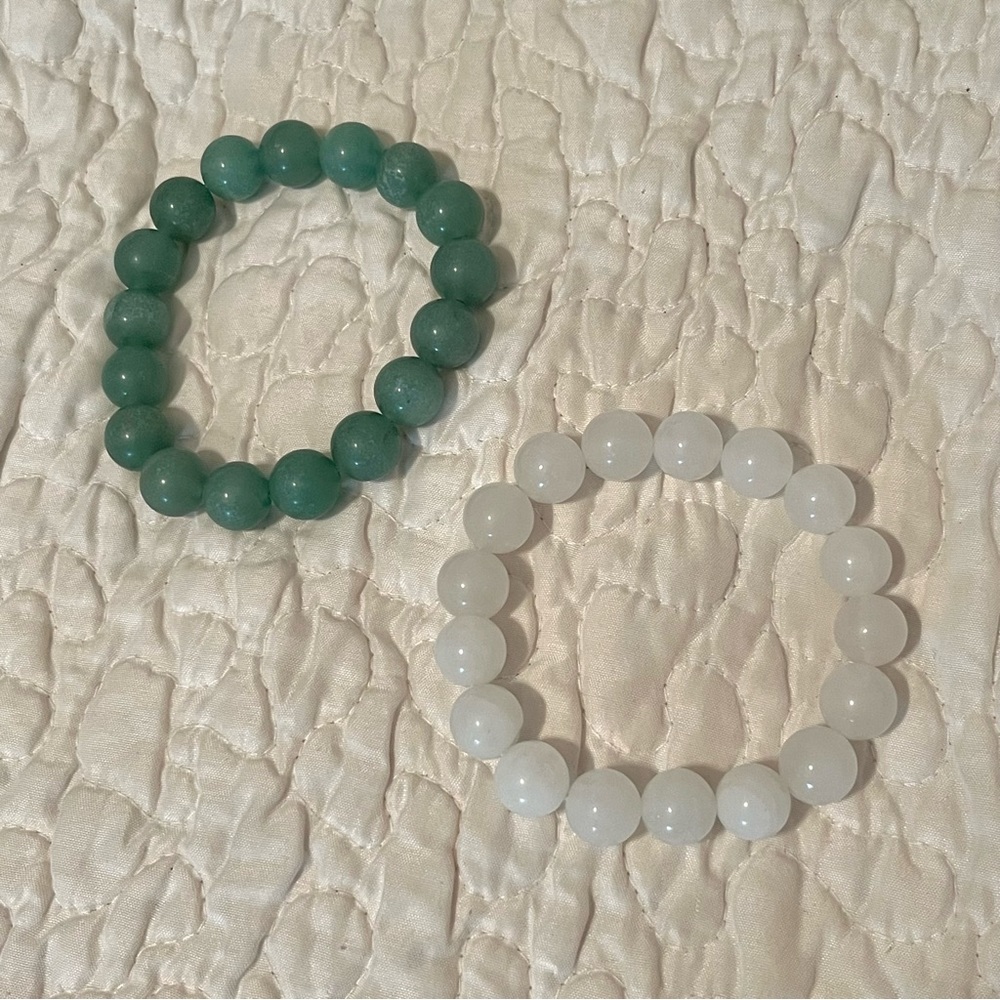 Green and white gemstone bracelets